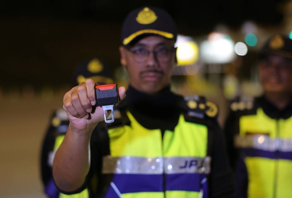 Negeri Sembilan Road Transport Department (RTD) director Hanif Yusabra Yusuf said the highest number of notices issued during the Special Chinese New Year Operation was for not wearing seat belts, with 195 offences recorded, of which over 30 per cent of them were found to be using the accessory, which resembles a real seat belt buckle. - Photo by Bernama