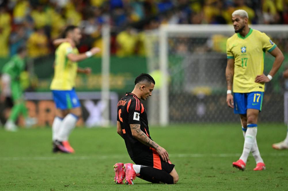 Colombia's midfielder #05 Kevin Castaño reacts after losing the 2026 FIFA World Cup South American qualifiers football match between Brazil and Colombia, at the Mane Garrincha stadium in Brasilia, on March 20, 2025. (Photo by EVARISTO SA / AFP)