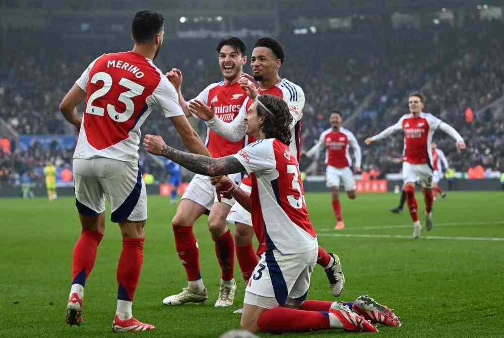 Pemain Arsenal meraikan jaringan Merino ketika bertemu Leicester City. Foto AFP